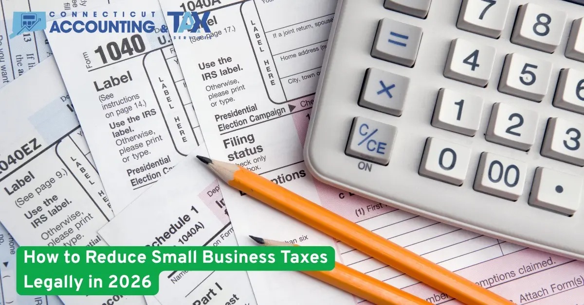 Calculator, pencil, and IRS tax forms on a desk with text about reducing small business taxes legally, representing tax planning and compliance.