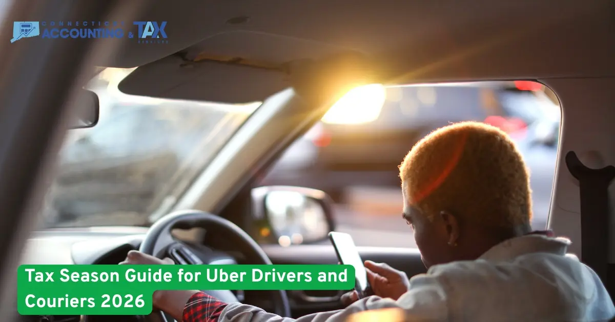 Uber driver checking phone while driving during sunset, representing tax season guidance for rideshare drivers and couriers in 2026